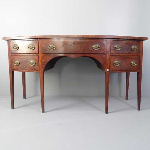 2007 - A George III mahogany bow-front side-board, with five fitted drawers and raised on square tapered le... 