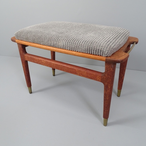 2012 - A mid-century Danish design teak and brass stool, the teak frame with brass handles and sabots. 68x4... 