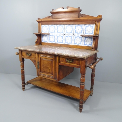 2013 - A Victorian mahogany marble topped wash stand, with raised tiled back and drawer and cupboard under.... 