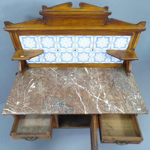 2013 - A Victorian mahogany marble topped wash stand, with raised tiled back and drawer and cupboard under.... 