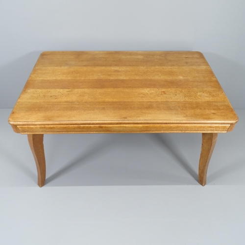 2015 - A 1930s French oak dining table, 138x74x90cm, and six matching chairs.