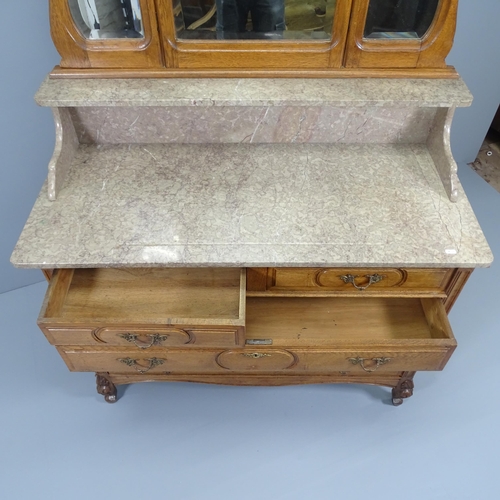 2016 - A French oak and marble-topped dressing chest, with raised mirror back, two short and three long dra... 