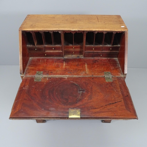 2021 - A Georgian mahogany Bureau, the fall front revealing a fitted interior, with four long drawers below... 