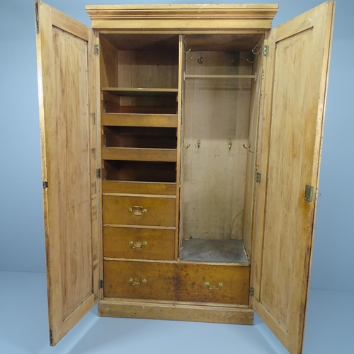 2025 - An antique pine two-door compactum wardrobe, with fitted interior. 116x206x57cm.