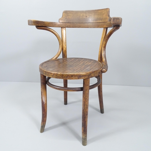 2029 - A Thonet-style bentwood elbow chair. Impressed 224 beneath seat.