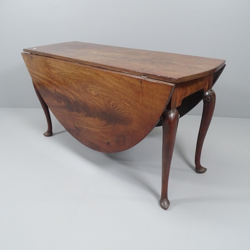 2045 - A Georgian mahogany oval drop-leaf dining table. 139x73x47cm (extending to 159cm).