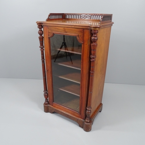 2048 - A Victorian mahogany music cabinet, with raised gallery, turned supports and single glazed panelled ... 