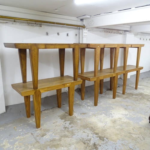 2501 - Six modern pine serving tables, each with single frieze drawer and raised on tapered legs. 130x77x55... 