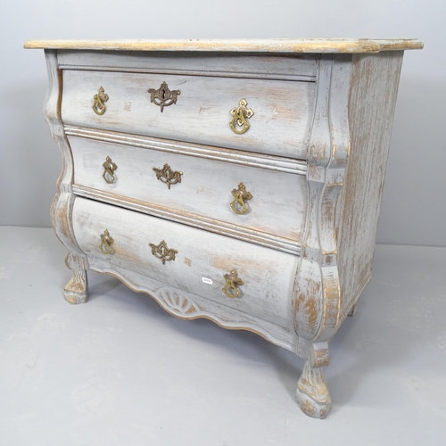 2506 - A continental style bombe chest of three drawers. 77x67x43cm.