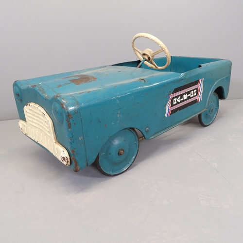 2511 - A vintage painted metal child's pedal car. Length 88cm.