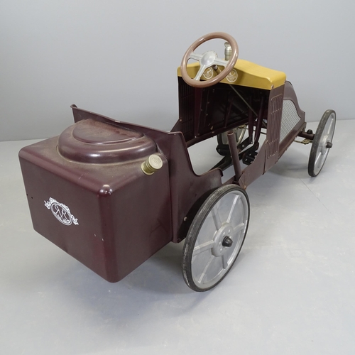 2512 - A vintage painted metal child's pedal car. Length 110cm