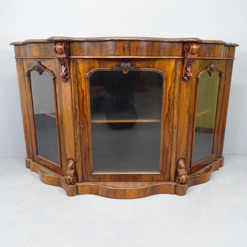 2518 - An antique rosewood veneered serpentine front credenza, with three glazed doors. 154x89x48cm.