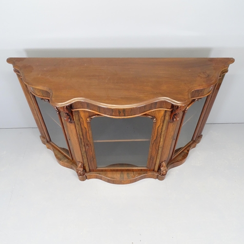 2518 - An antique rosewood veneered serpentine front credenza, with three glazed doors. 154x89x48cm.