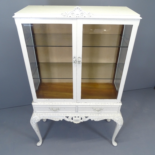 2520 - A continental style display cabinet with two glazed doors above two frieze drawers, two adjustable s... 