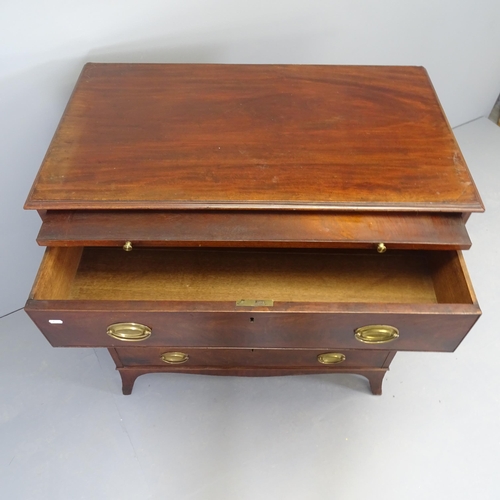 2521 - A Georgian mahogany chest of four long drawers, with brushing slide. 95x99x55cm.