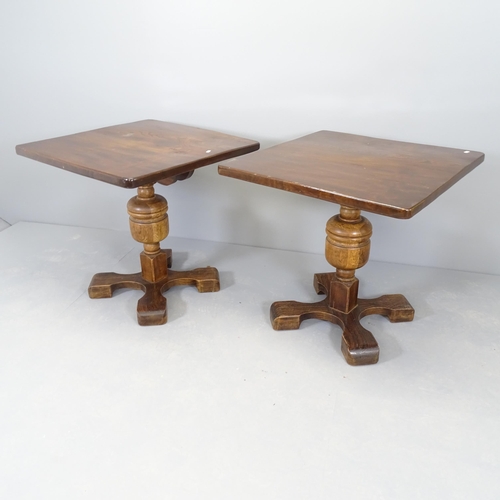 2525 - A pair of oak pub tables, raised on baluster turned central column with platform base. 72x70x71cm