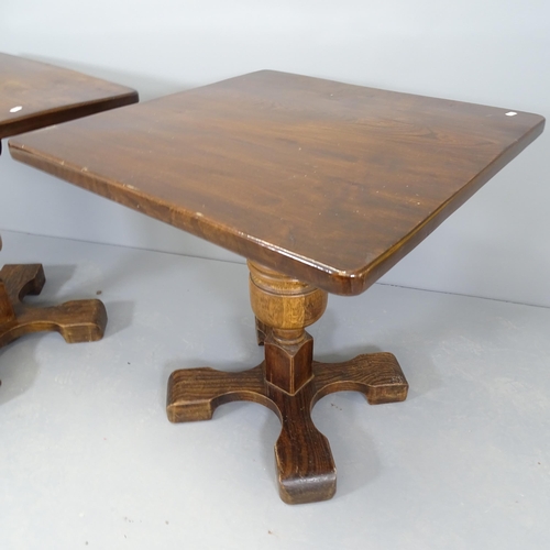 2525 - A pair of oak pub tables, raised on baluster turned central column with platform base. 72x70x71cm