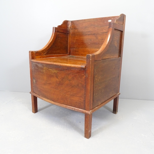 2534 - An antique mahogany commode chair. 56x79x50cm