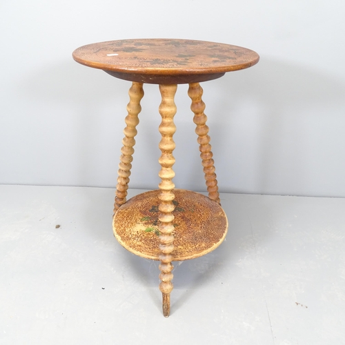 2536 - An antique mahogany two-tier circular occasional table, one bobbin turned legs. 44x67cm.