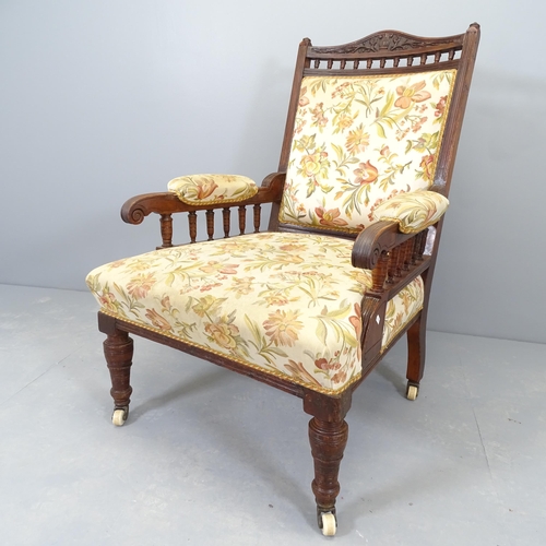 2540 - A Victorian mahogany and upholstered lounge chair.