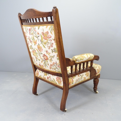 2540 - A Victorian mahogany and upholstered lounge chair.