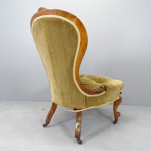 2543 - A Victorian walnut and upholstered nursing chair.