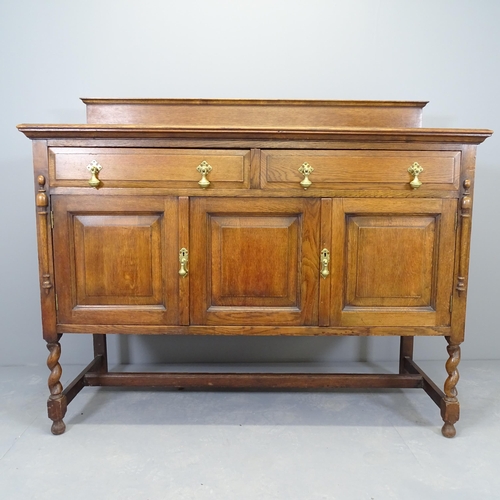 2546 - An early 20th century oak sideboard, with raised back, two frieze drawers and cupboards under. 138x1... 