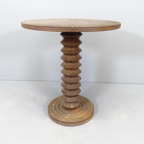 2549 - A French elm circular topped occasional table, raised on turned column with platform base. 50x56cm.