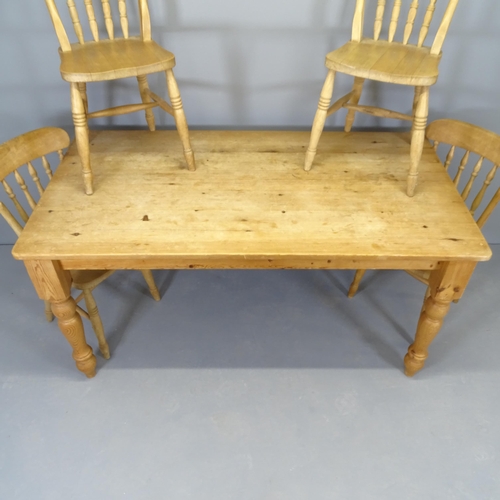 2551 - A modern pine scrub top dining table raised on turned legs, 159x77x85cm, and four matching chairs.