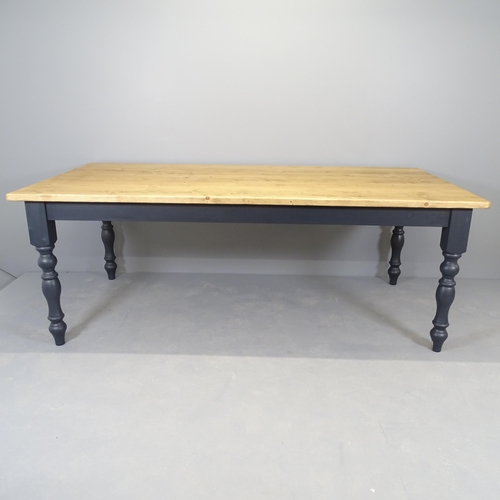 2553 - A modern painted pine dining table, with turned legs. 210x77x105cm