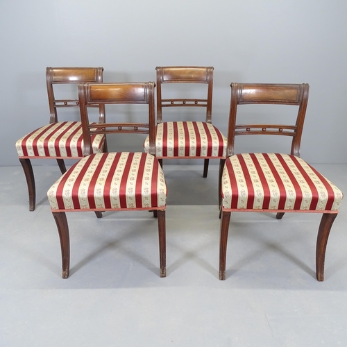 2555 - A set of four Georgian mahogany dining chairs.