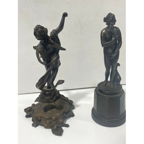 88 - A small Classical bronze nude on white metal plinth, and another reproduction bronze figure