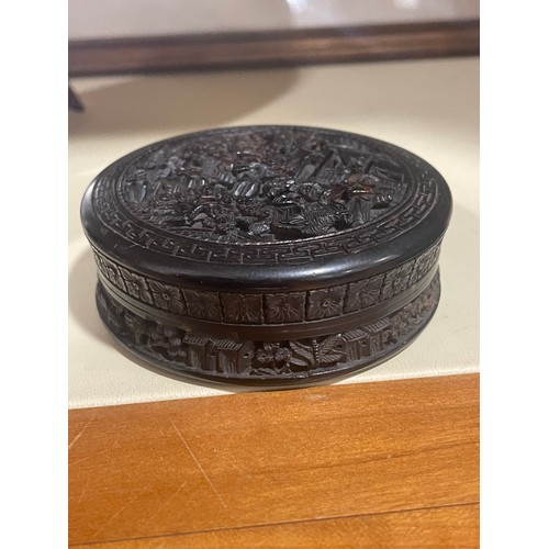 33 - A Chinese carved tortoiseshell box and cover, with another circular carved box, diameter 8cm