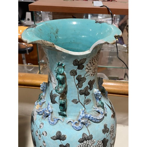 21 - 2 large blue glazed Chinese vases with applied dragon and lion decoration, height 47cm, A/F
