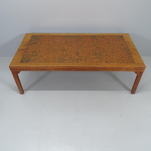 2132 - A mid-century teak coffee table, the top being teak veneered and having an inset copper top. 140x45x... 