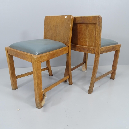 2144 - A set of four 1930s oak framed low back dining chairs with drop in seats.