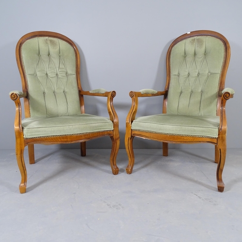 2560 - A pair of Victorian mahogany and button-back upholstered lounge chairs.