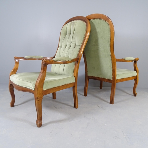 2560 - A pair of Victorian mahogany and button-back upholstered lounge chairs.