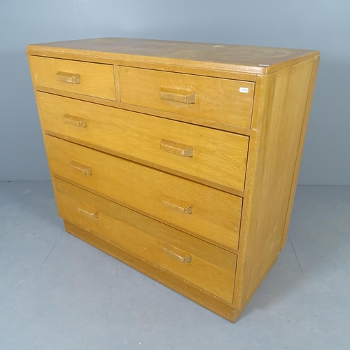 2568 - A mid-century teak chest of two short and three long drawers. 107x96x51cm.