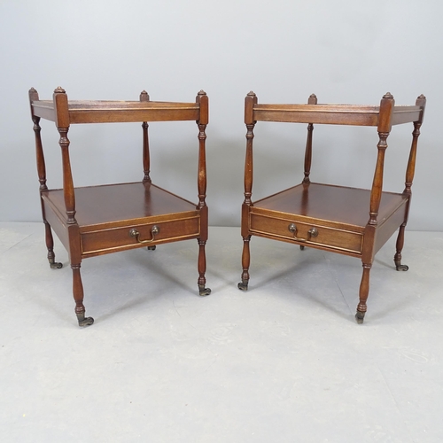 2577 - A pair of antique mahogany two-tier bedside tables, with single frieze drawer and raised on casters.... 