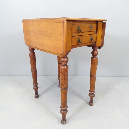 2579 - A Victorian mahogany drop-leaf bedside table, with two frieze drawers and raised on turned legs. 36x... 