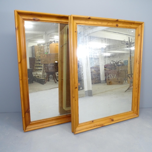 2583 - A pair of large modern pine framed wall mirrors. 108x140cm.