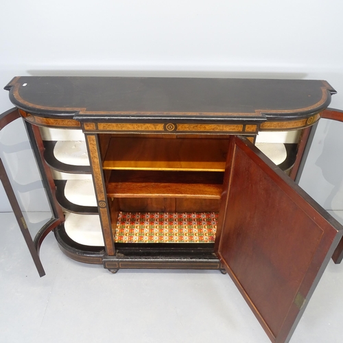 2592 - A Victorian ebonized and satinwood strung bow-end credenza, with glazed doors, inlaid walnut panels ... 