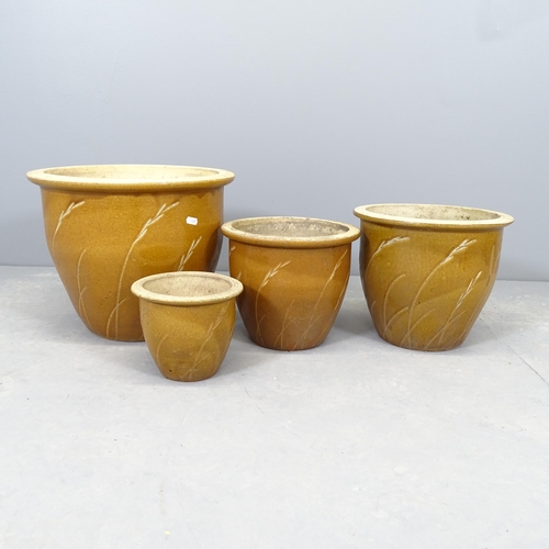 2608 - A graduated set of four glazed ceramic garden planters. Largest 38x31cm.