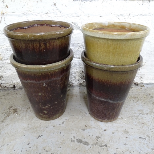 2612 - Four glazed terracotta garden pots. 26x33cm.