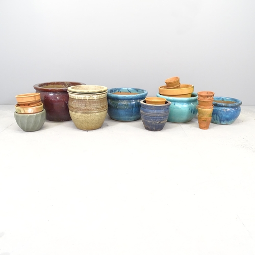 2613 - Seven assorted glazed ceramic garden planters, and a quantity of terracotta plant pots. Largest 40x2... 