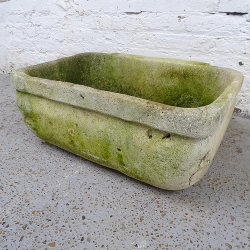 2627 - A weathered stone sink. 73x29x53cm.