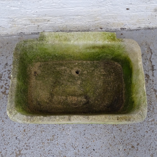 2627 - A weathered stone sink. 73x29x53cm.