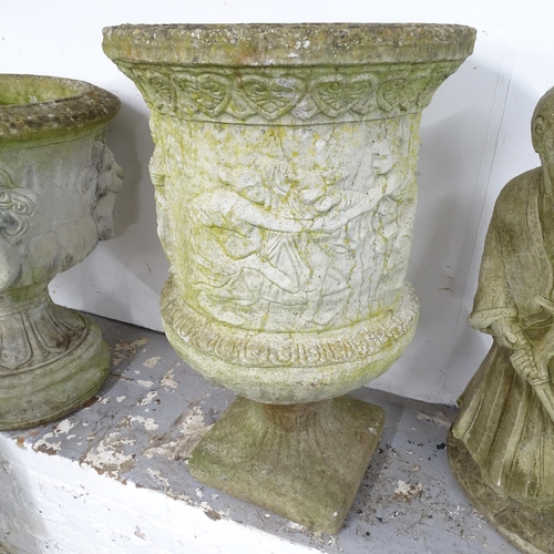 2639 - A weathered concrete two section garden urn. 48x75cm