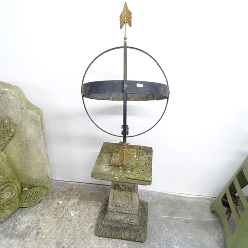 2641 - A wrought iron armillary sphere, mounted on a weathered concrete plinth. 42x130x45cm.